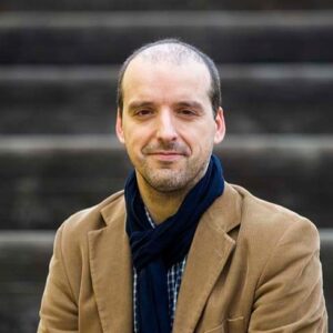 Headshot of Nuno Fonseca wearing a brown color jacket